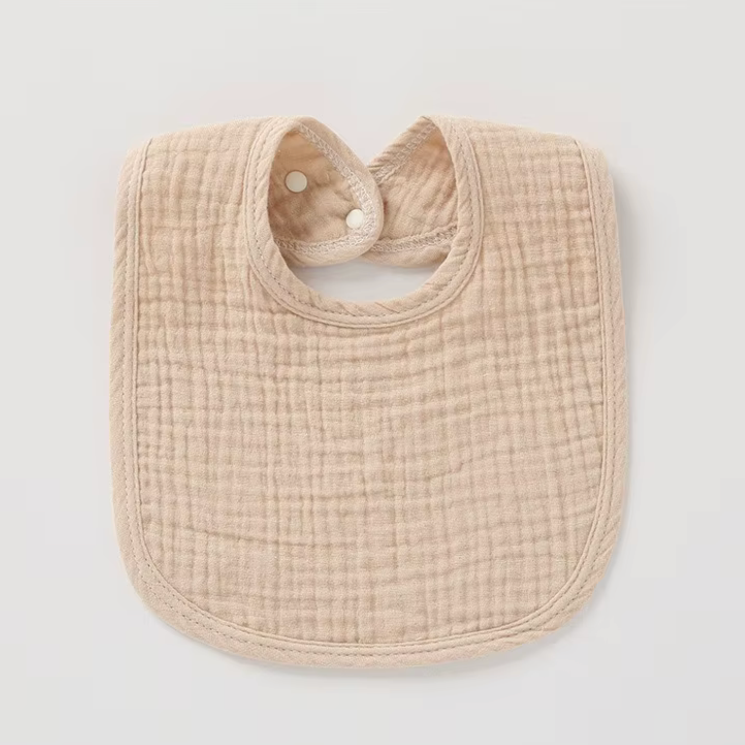 Bavoir en gaze de coton beige